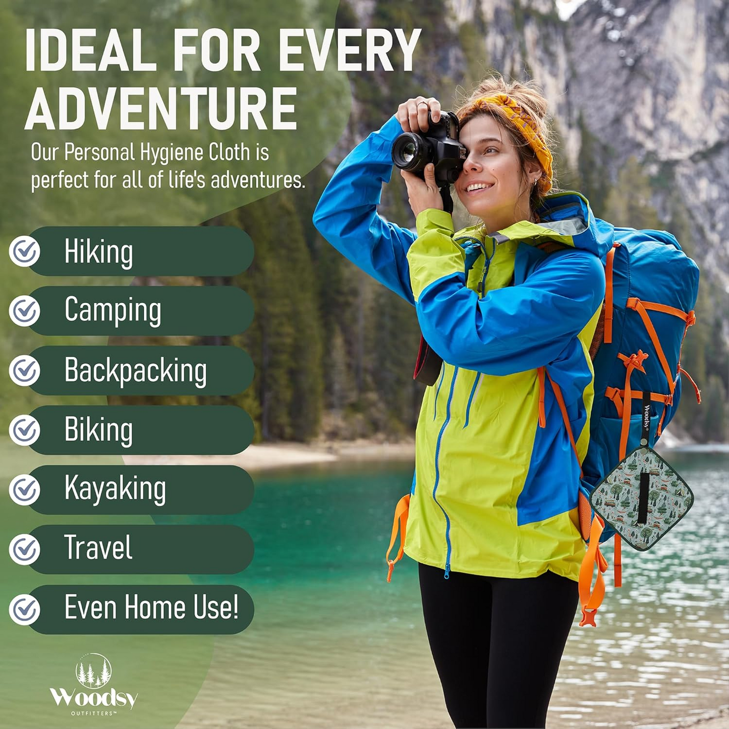 Person with a backpack and camera in a mountainous area, promoting a personal hygiene cloth for various activities.